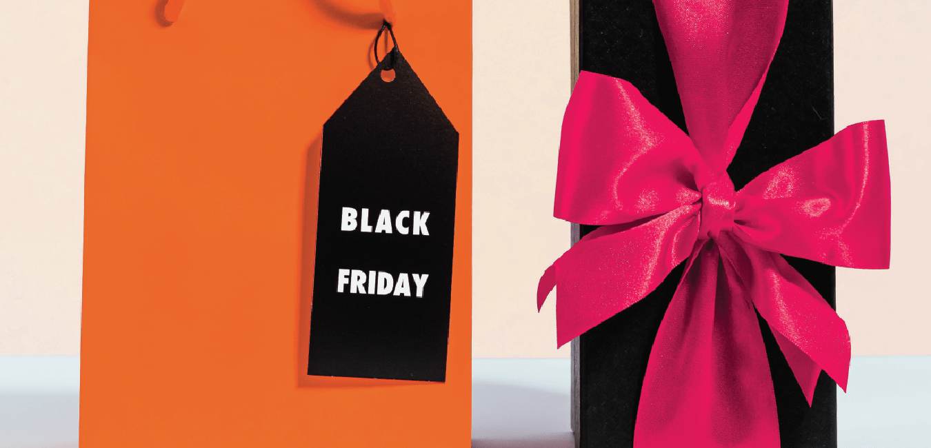 black-friday-tag-next-to-a-gift-with-ribbon-illustration